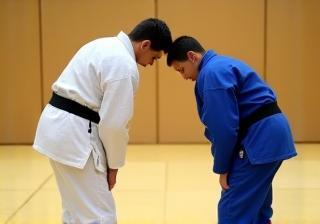 Judo students bowing respectfully at Al Fursan